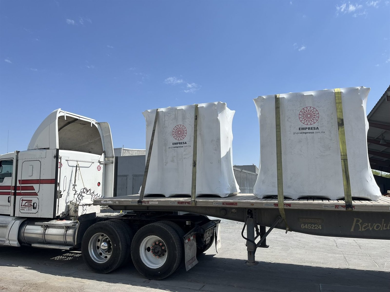 Wrapped units on a flatbed ready for export